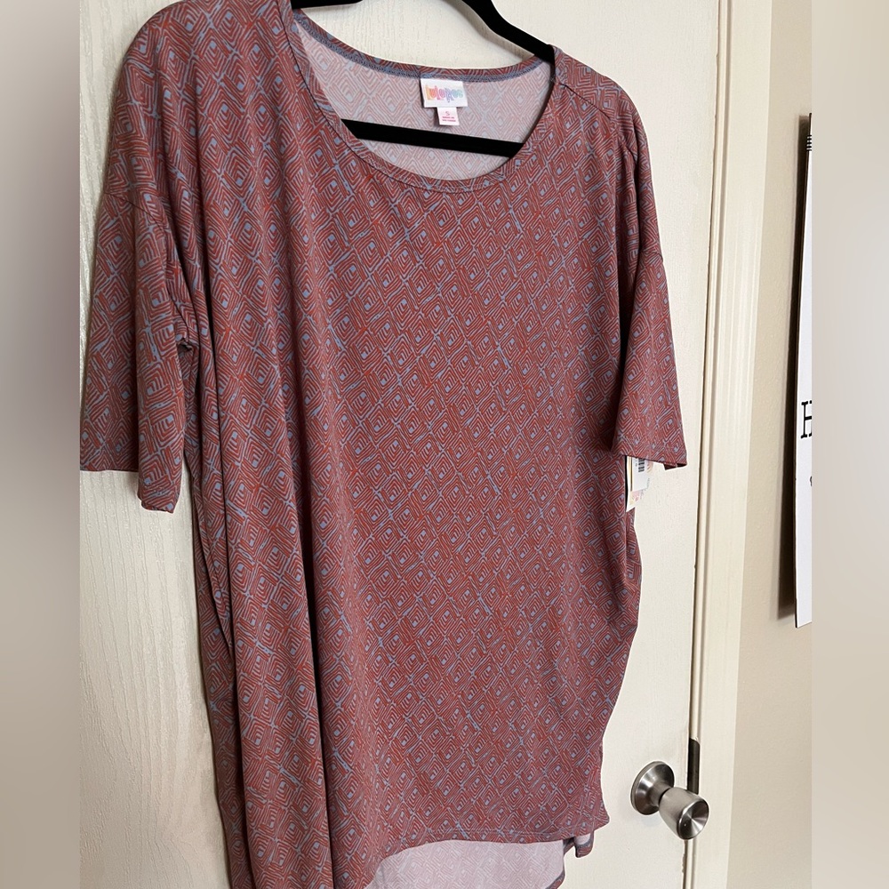NWT Lularoe Irma size small. Orange and blue-ish color